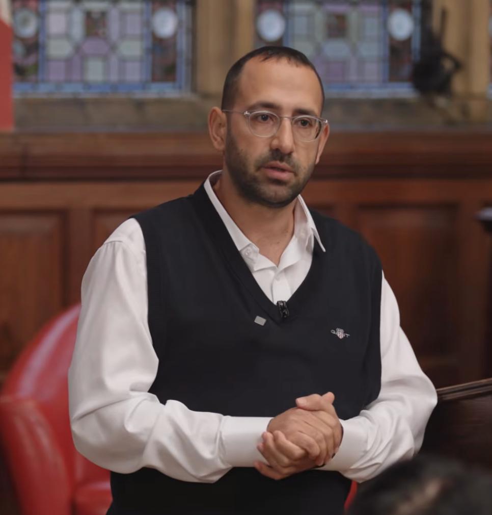 Yonatan Sompolinsky speaking at the Oxford Union in March 2026